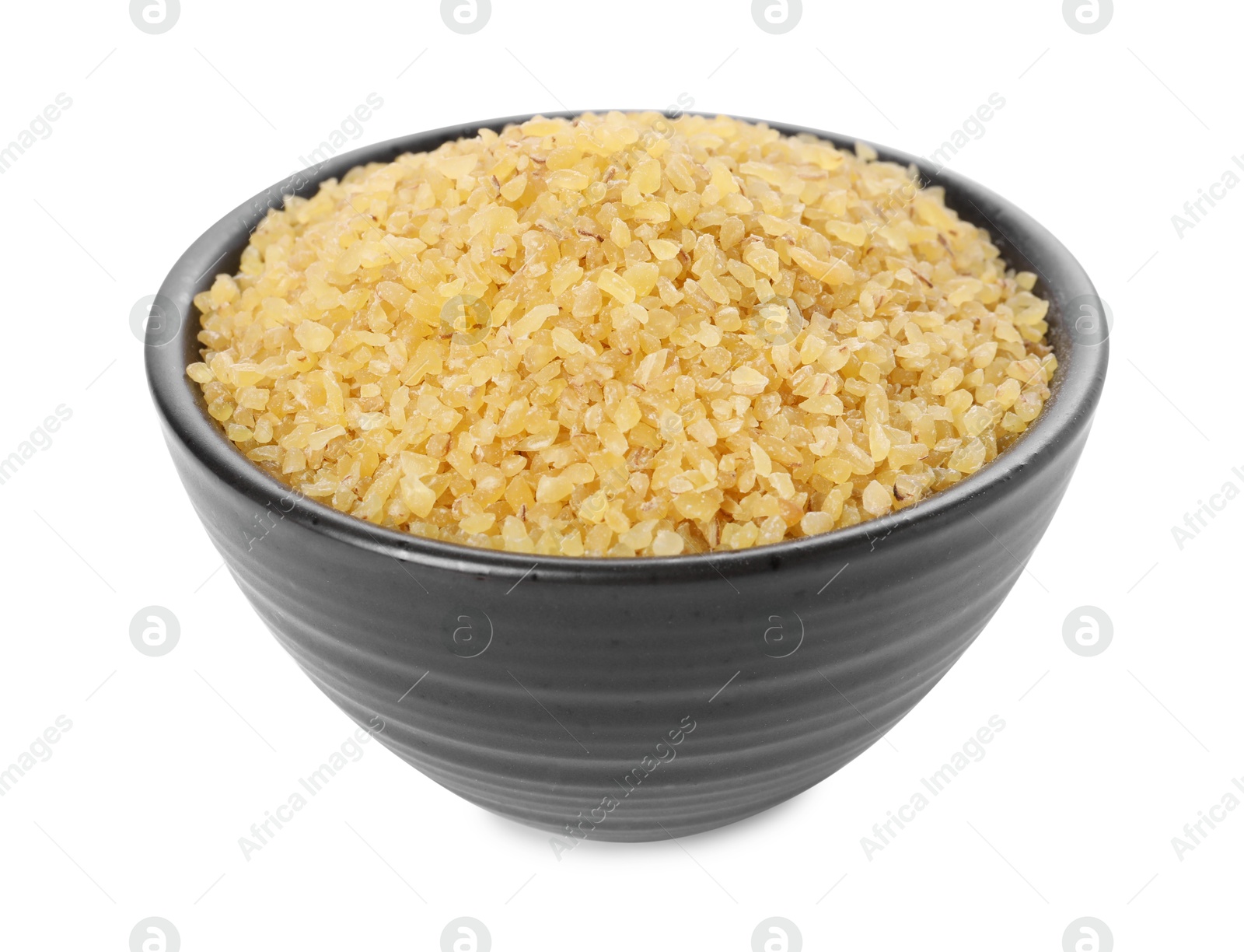 Photo of Raw bulgur in bowl isolated on white