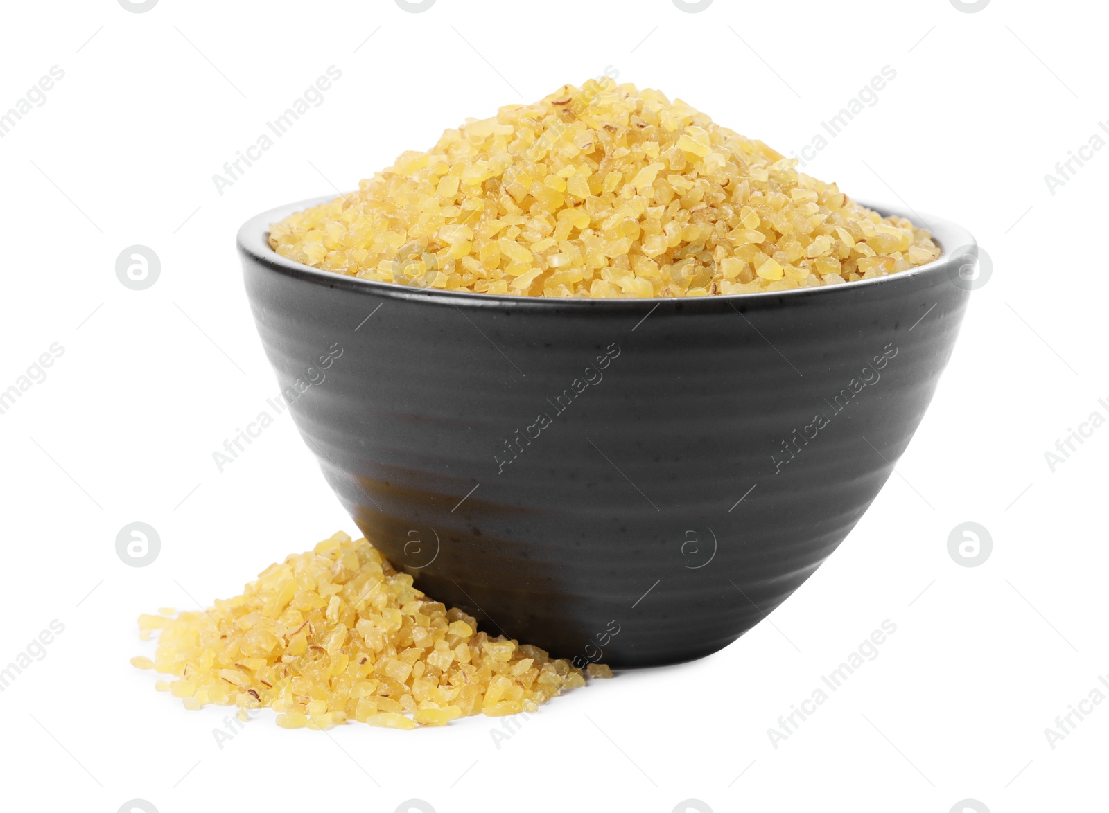 Photo of Raw bulgur in bowl isolated on white