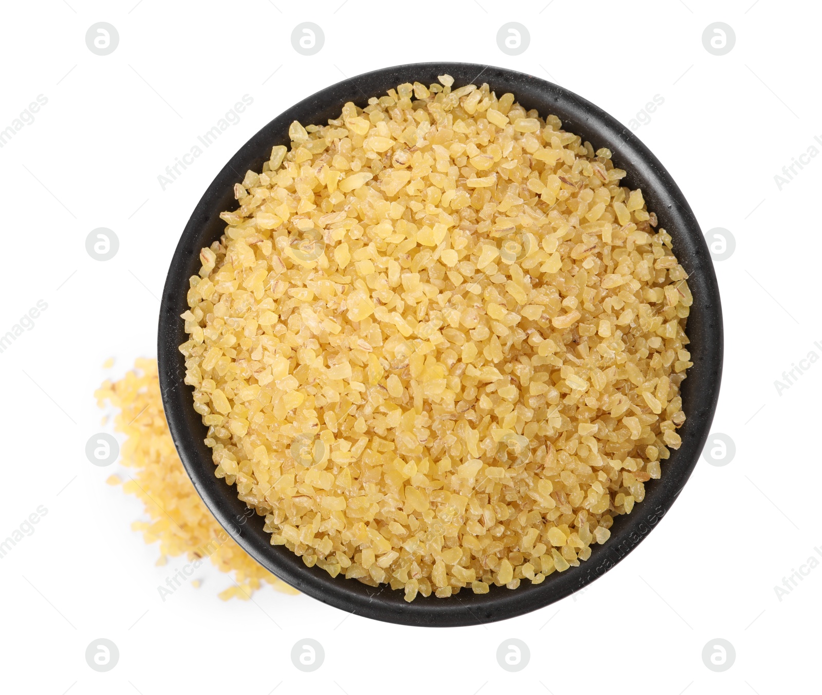 Photo of Raw bulgur in bowl isolated on white, top view