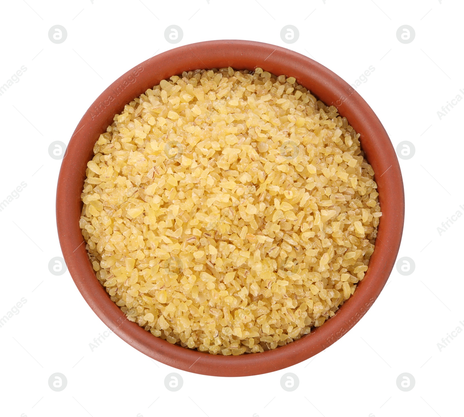 Photo of Raw bulgur in bowl isolated on white, top view