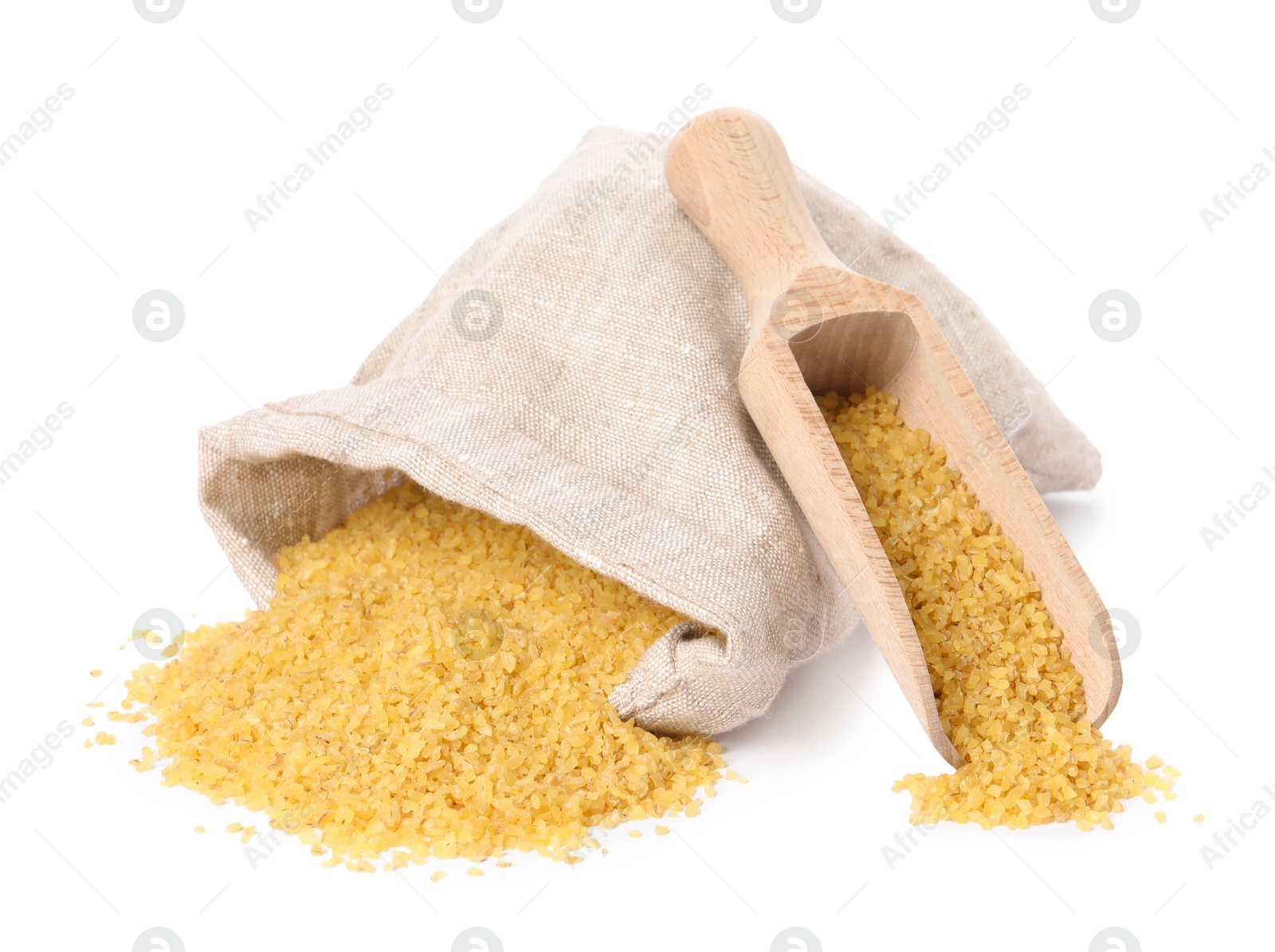 Photo of Raw bulgur, overturned burlap sack and wooden scoop isolated on white