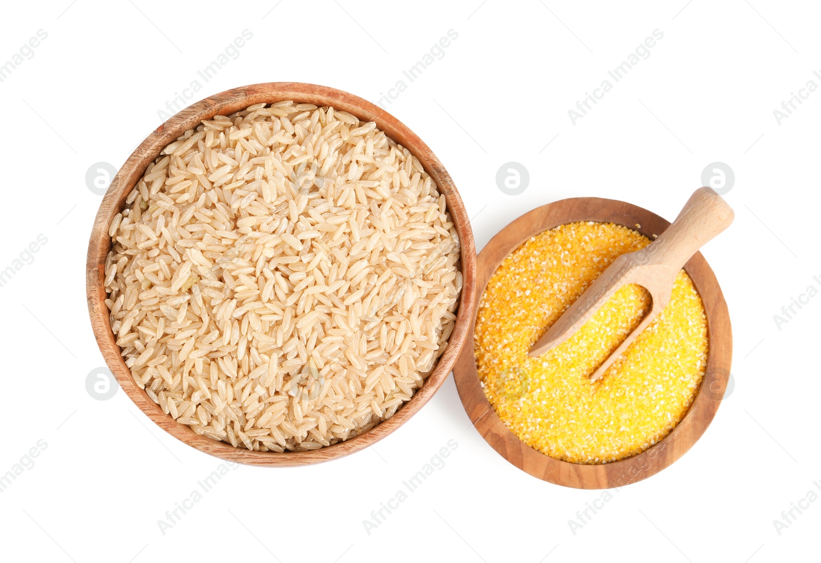 Photo of Different cereal grains in wooden bowls and scoop isolated on white, top view