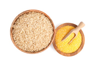 Photo of Different cereal grains in wooden bowls and scoop isolated on white, top view