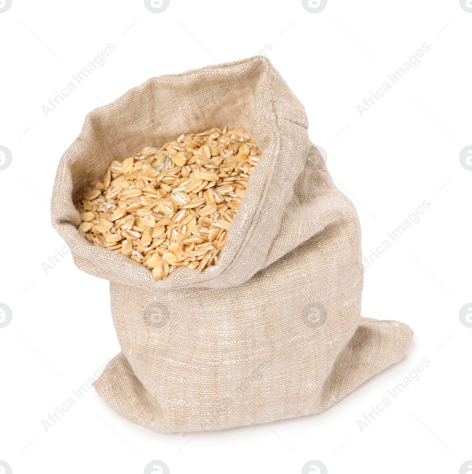 Photo of Dry oat flakes in burlap sack isolated on white