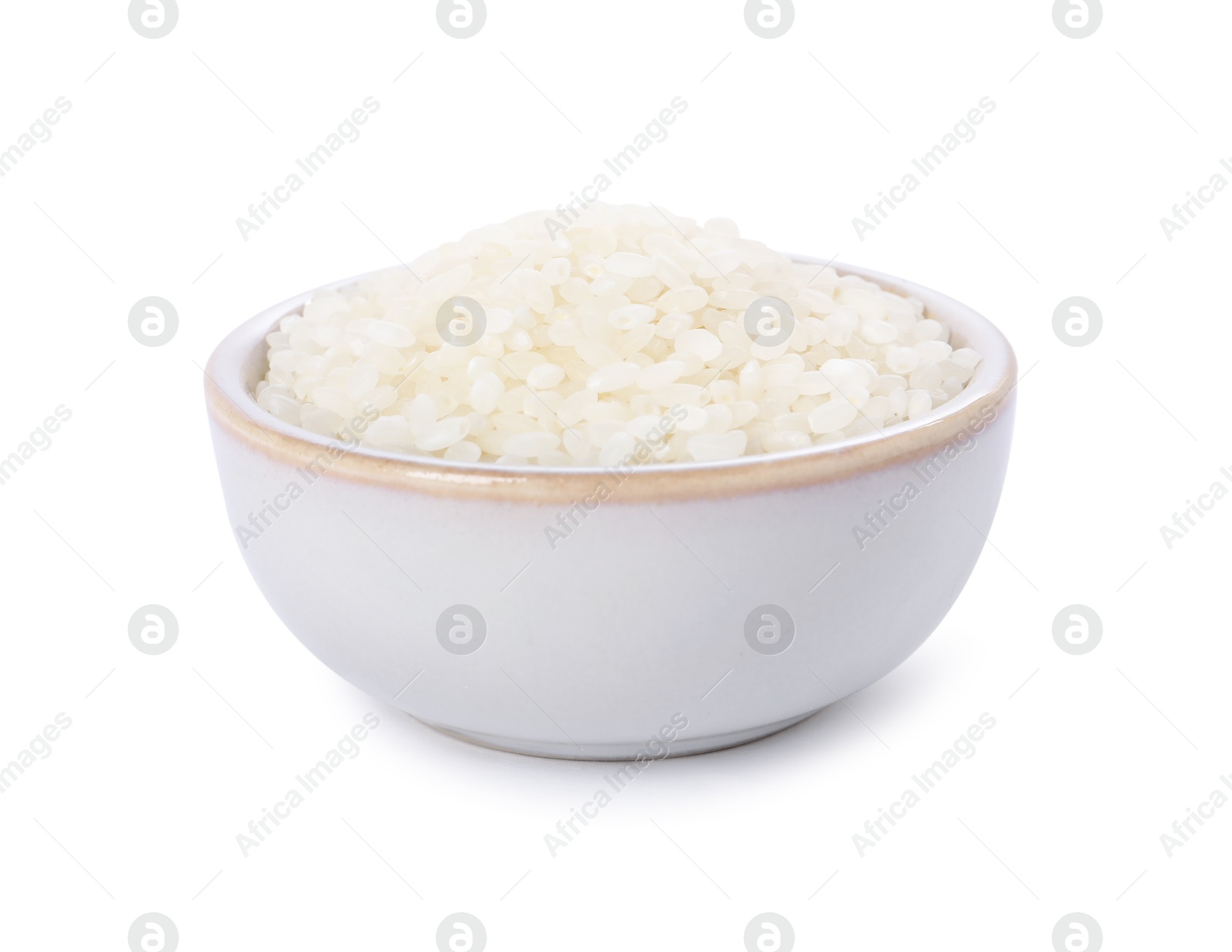 Photo of Raw rice in bowl isolated on white