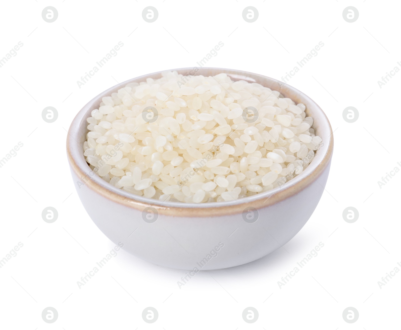 Photo of Raw rice in bowl isolated on white