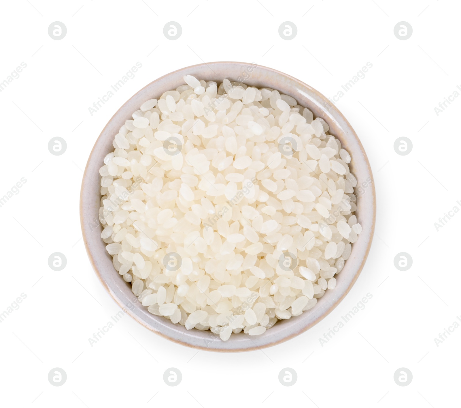 Photo of Raw rice in bowl isolated on white, top view