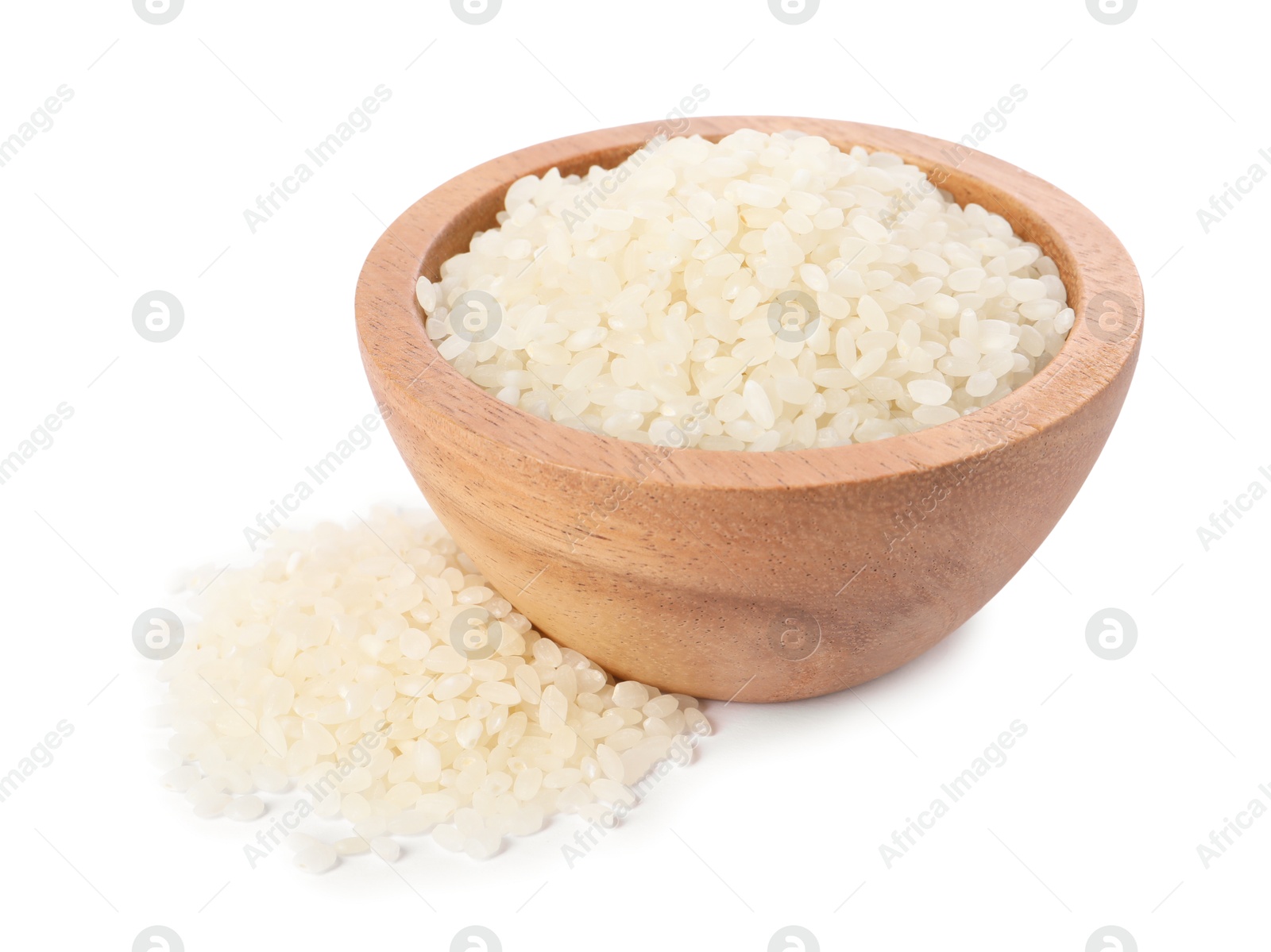 Photo of Raw rice in wooden bowl isolated on white