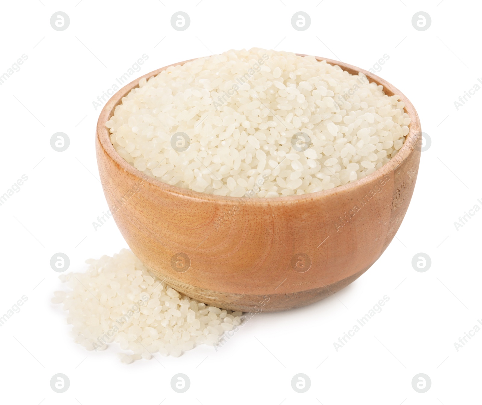 Photo of Raw rice in wooden bowl isolated on white