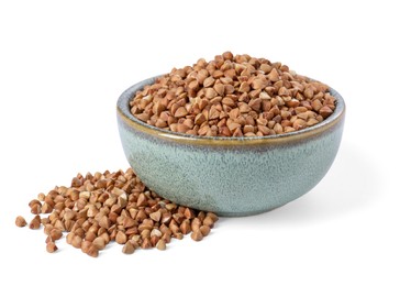 Photo of Raw buckwheat in bowl isolated on white