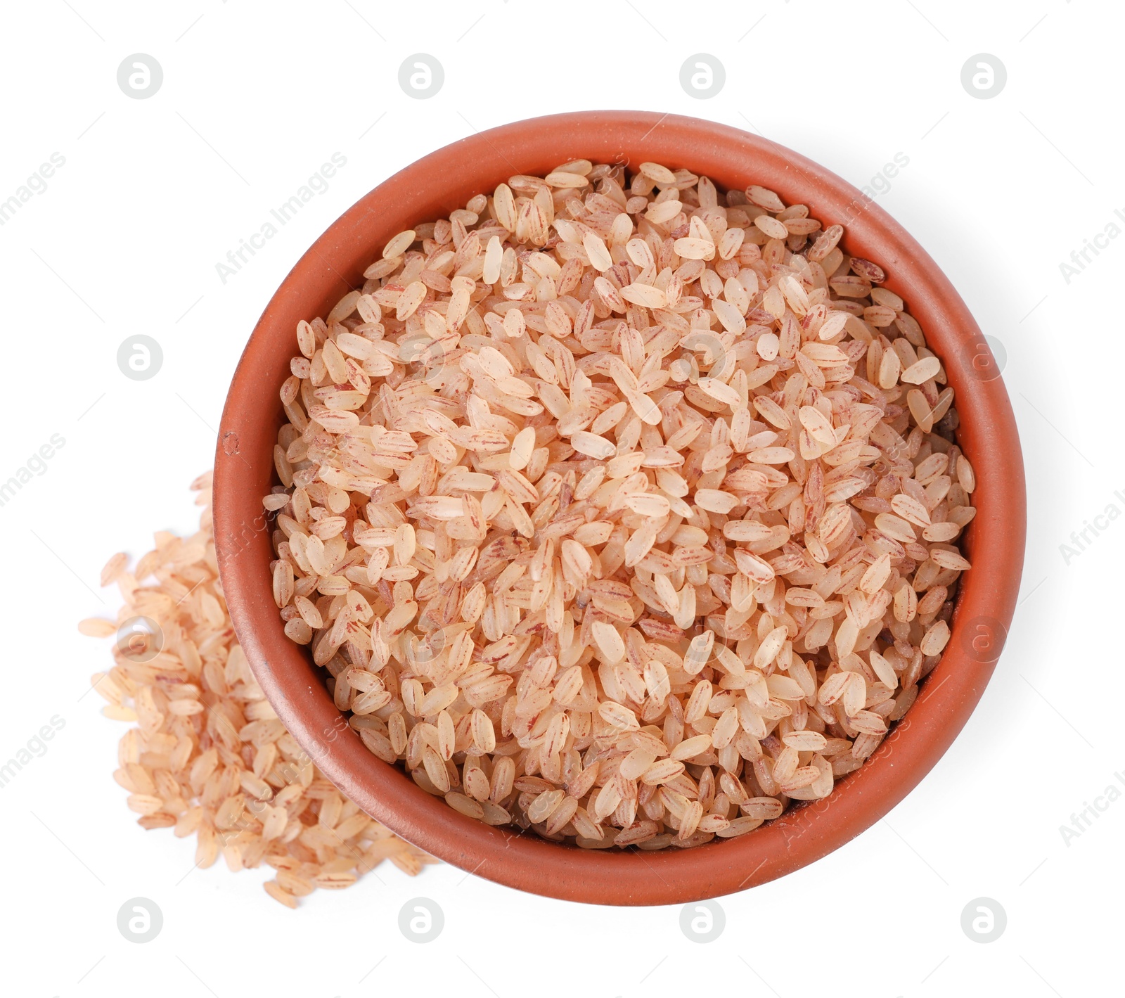 Photo of Raw organic matta rice in bowl isolated on white, top view