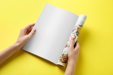 Woman reading magazine on yellow background, closeup. Mockup for design