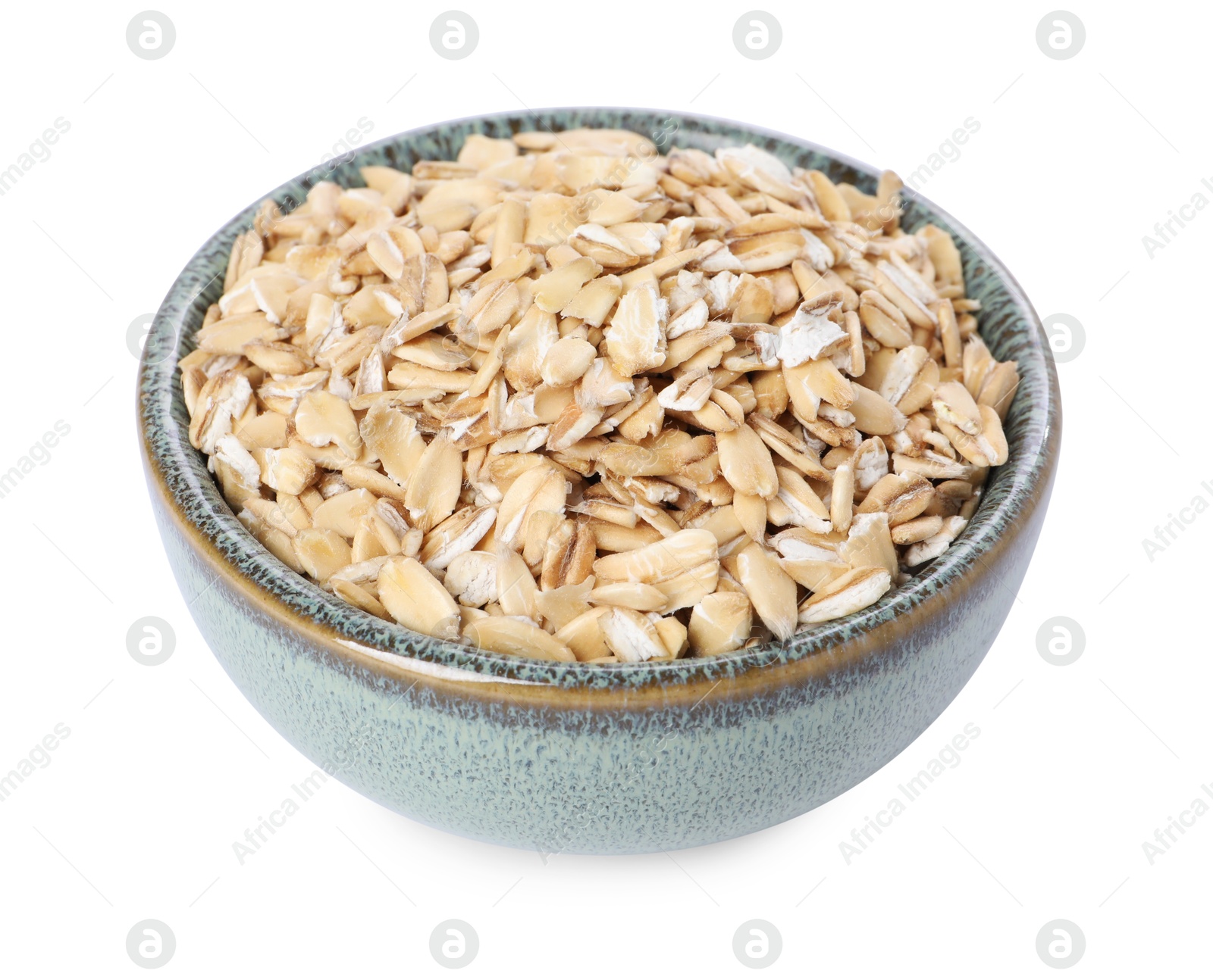 Photo of Dry oat flakes in bowl isolated on white