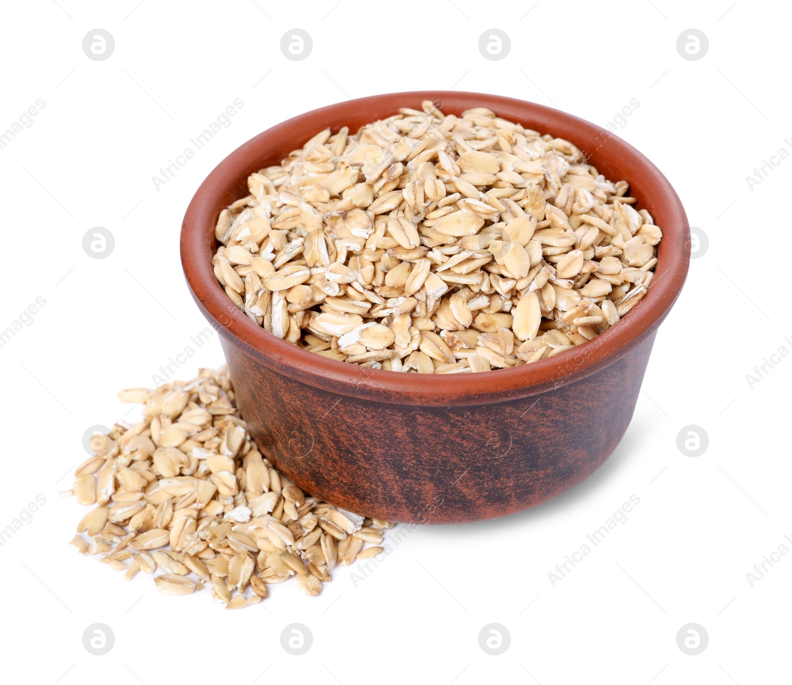 Photo of Dry oat flakes in bowl isolated on white