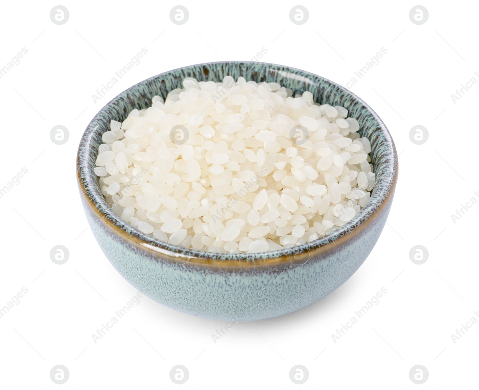 Photo of Raw rice in bowl isolated on white