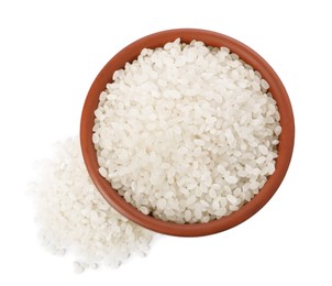 Photo of Raw rice in bowl isolated on white, top view