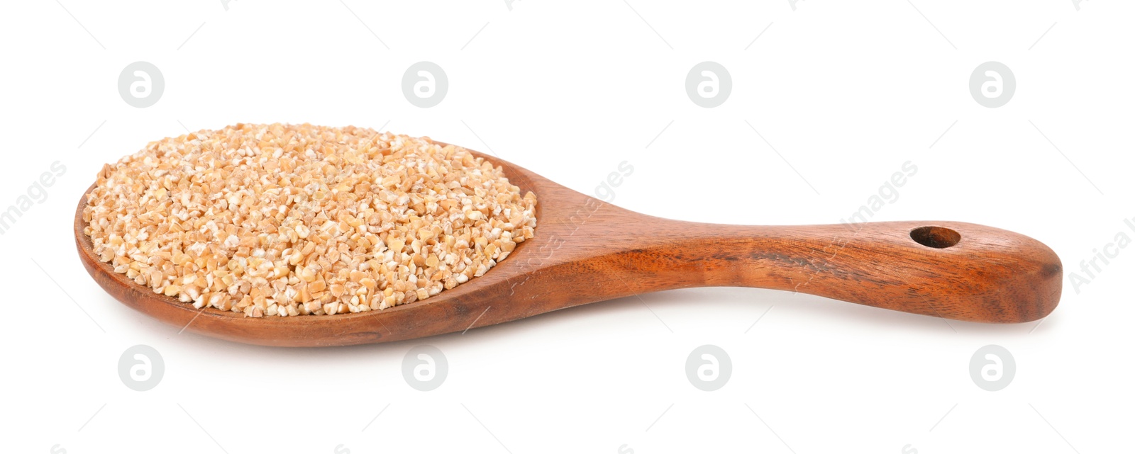 Photo of Dry wheat groats in wooden spoon isolated on white