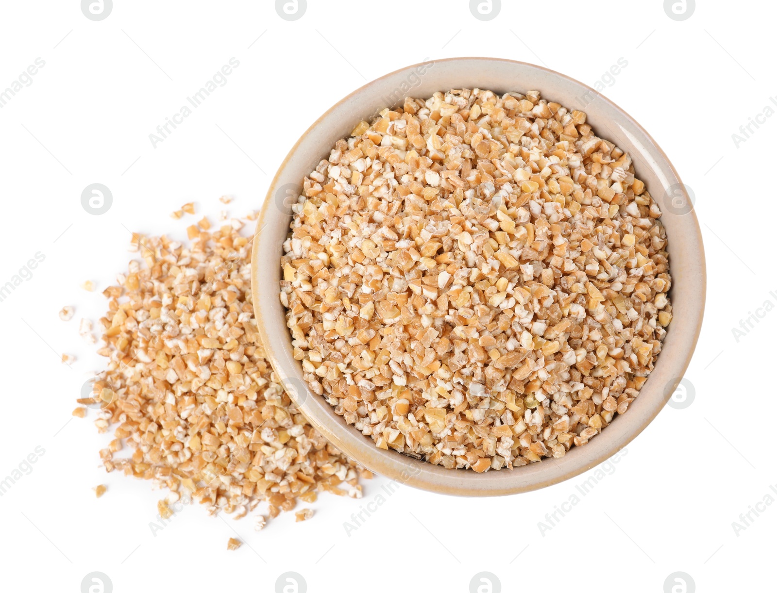 Photo of Dry wheat groats in bowl isolated on white, top view