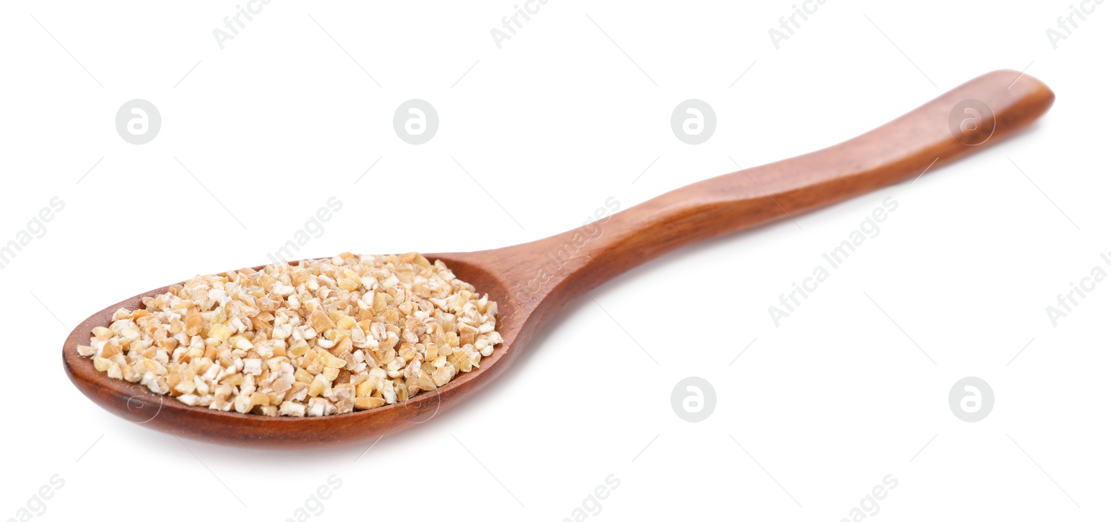 Photo of Dry wheat groats in wooden spoon isolated on white