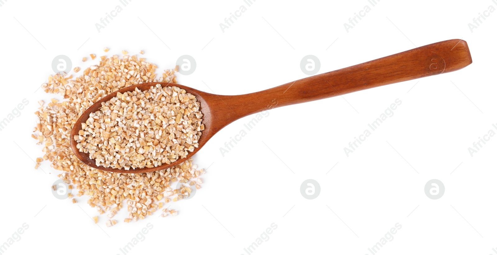 Photo of Dry wheat groats in wooden spoon isolated on white, top view