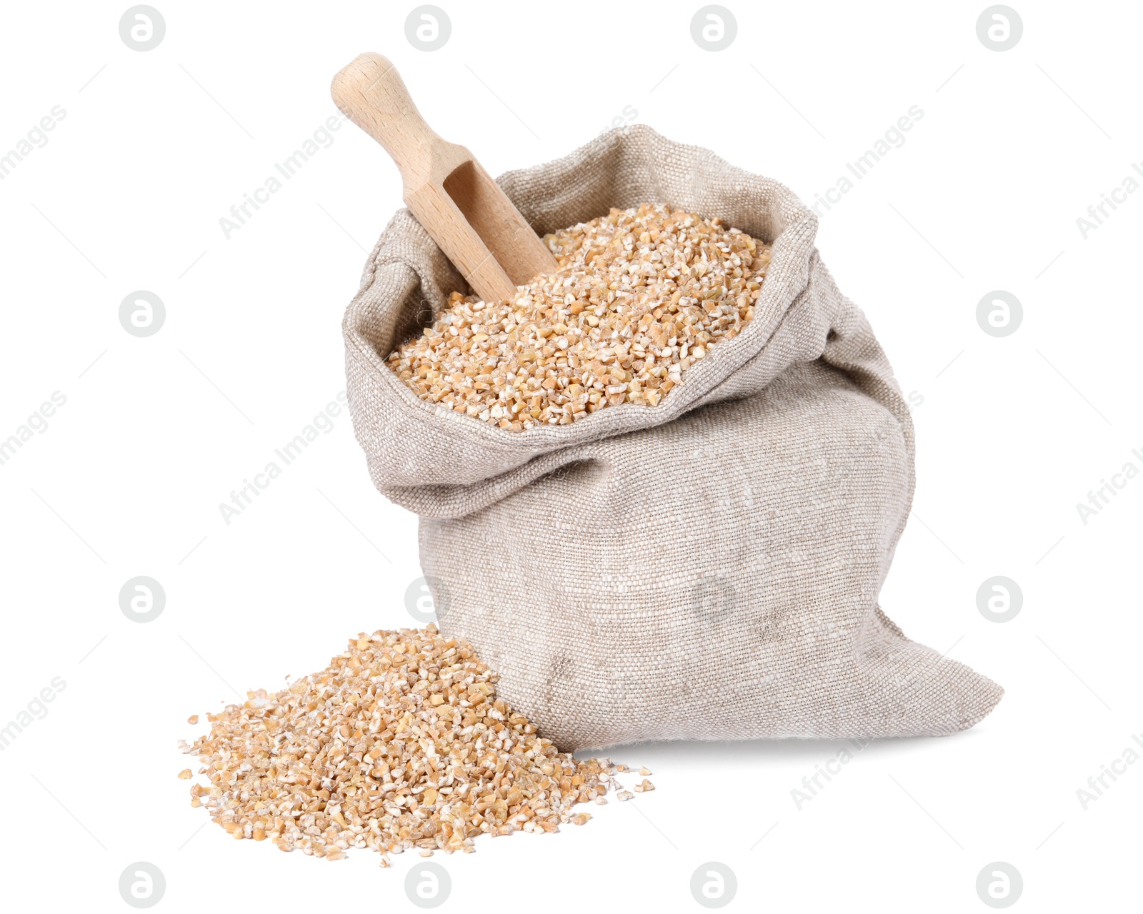 Photo of Dry wheat groats, burlap sack and wooden scoop isolated on white