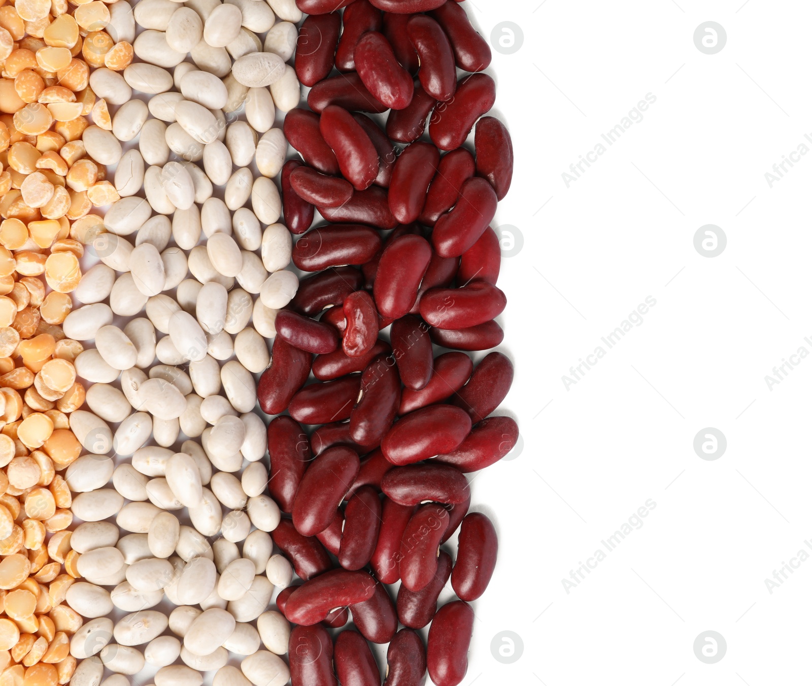 Photo of Different types of legumes isolated on white, top view