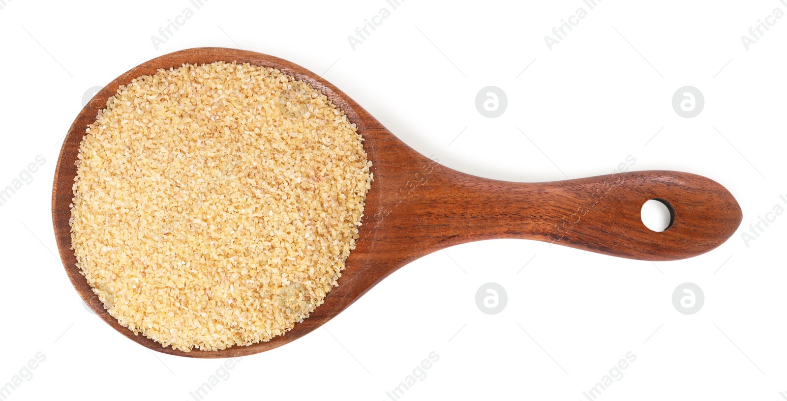 Photo of Spoon with raw wheat groats isolated on white, top view