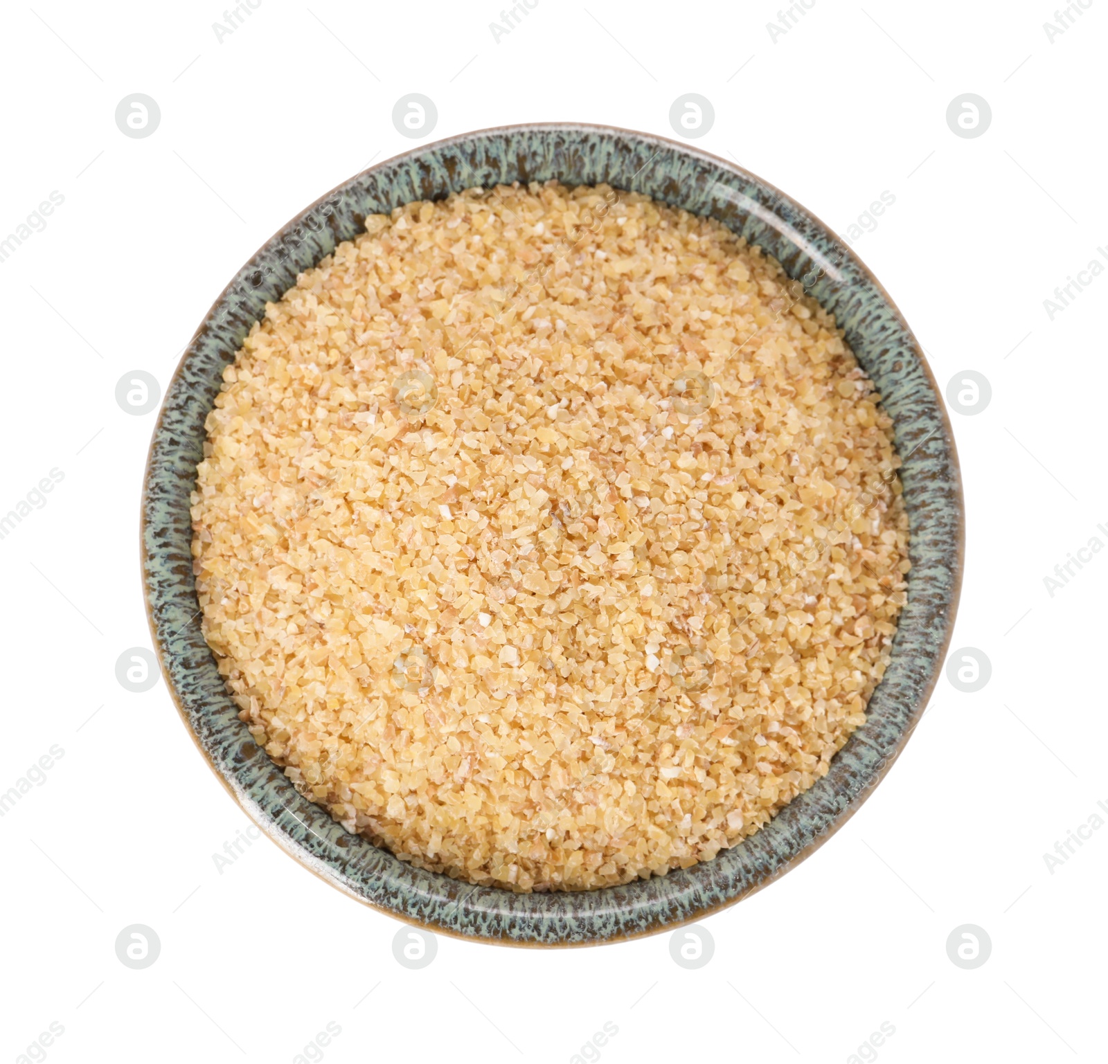 Photo of Raw wheat groats in bowl isolated on white, top view