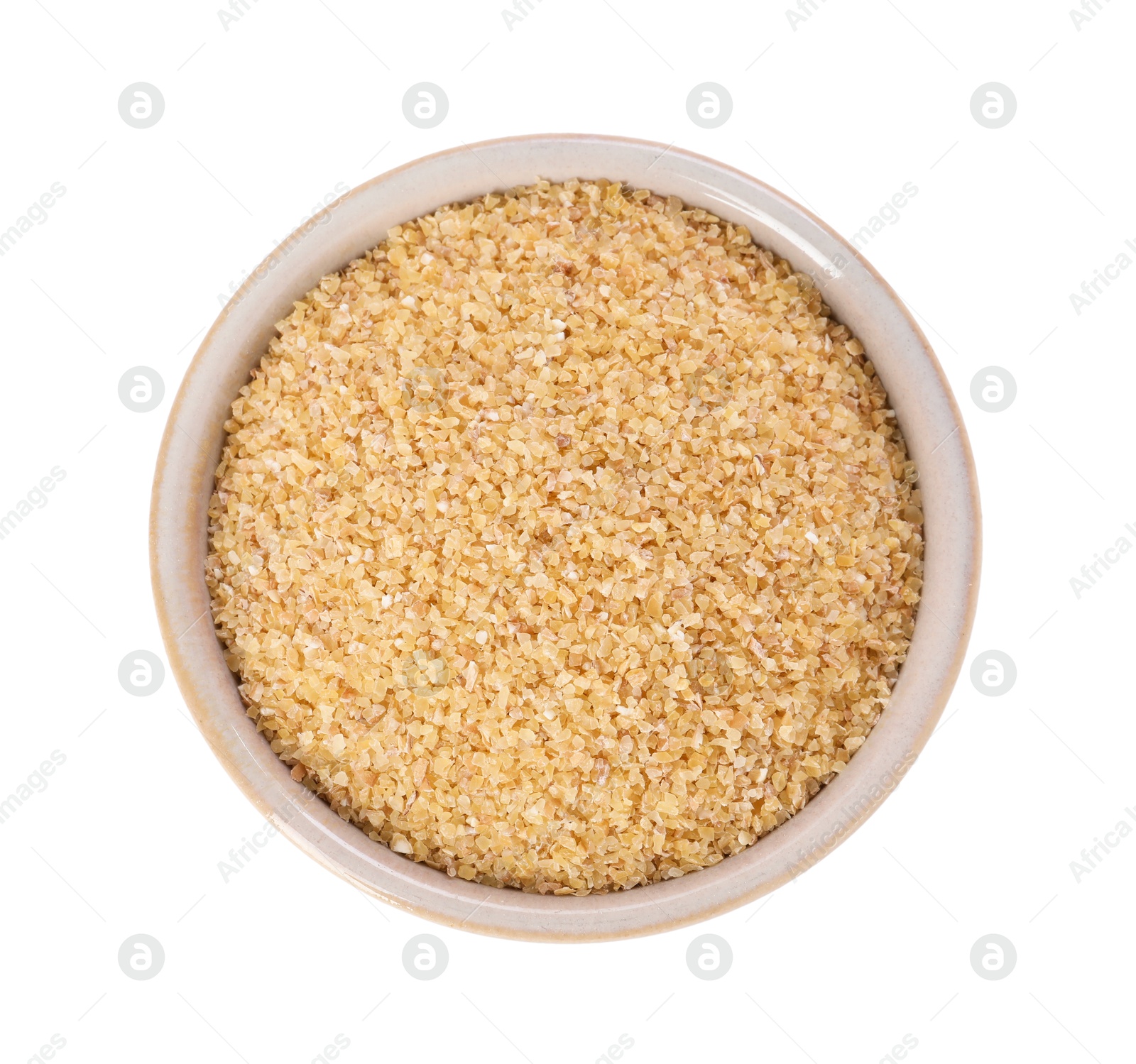 Photo of Raw wheat groats in bowl isolated on white, top view