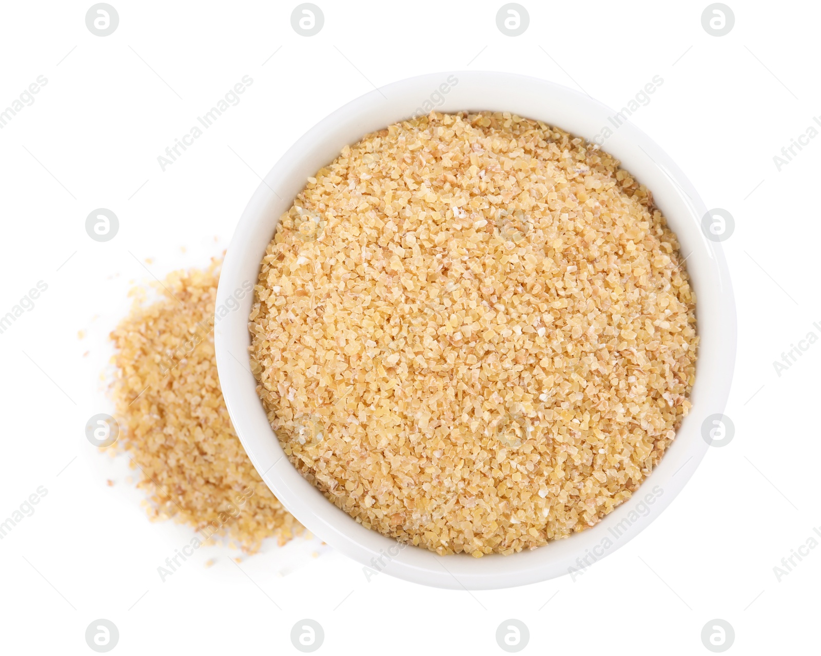 Photo of Raw wheat groats in bowl isolated on white, top view