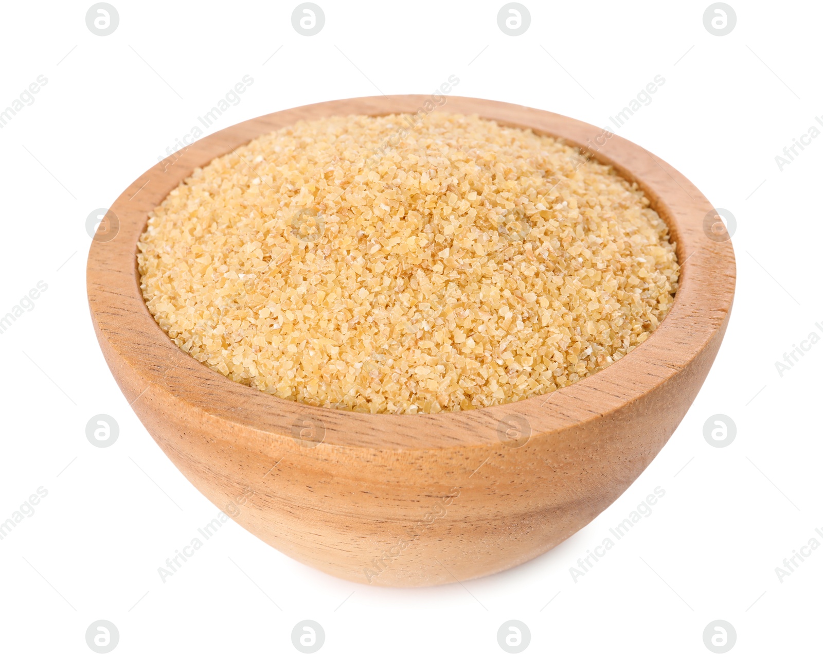 Photo of Raw wheat groats in bowl isolated on white