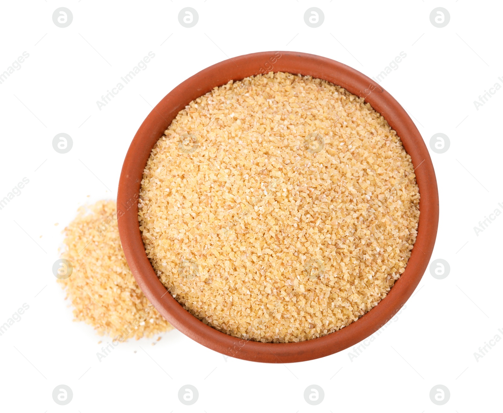 Photo of Raw wheat groats in bowl isolated on white, top view