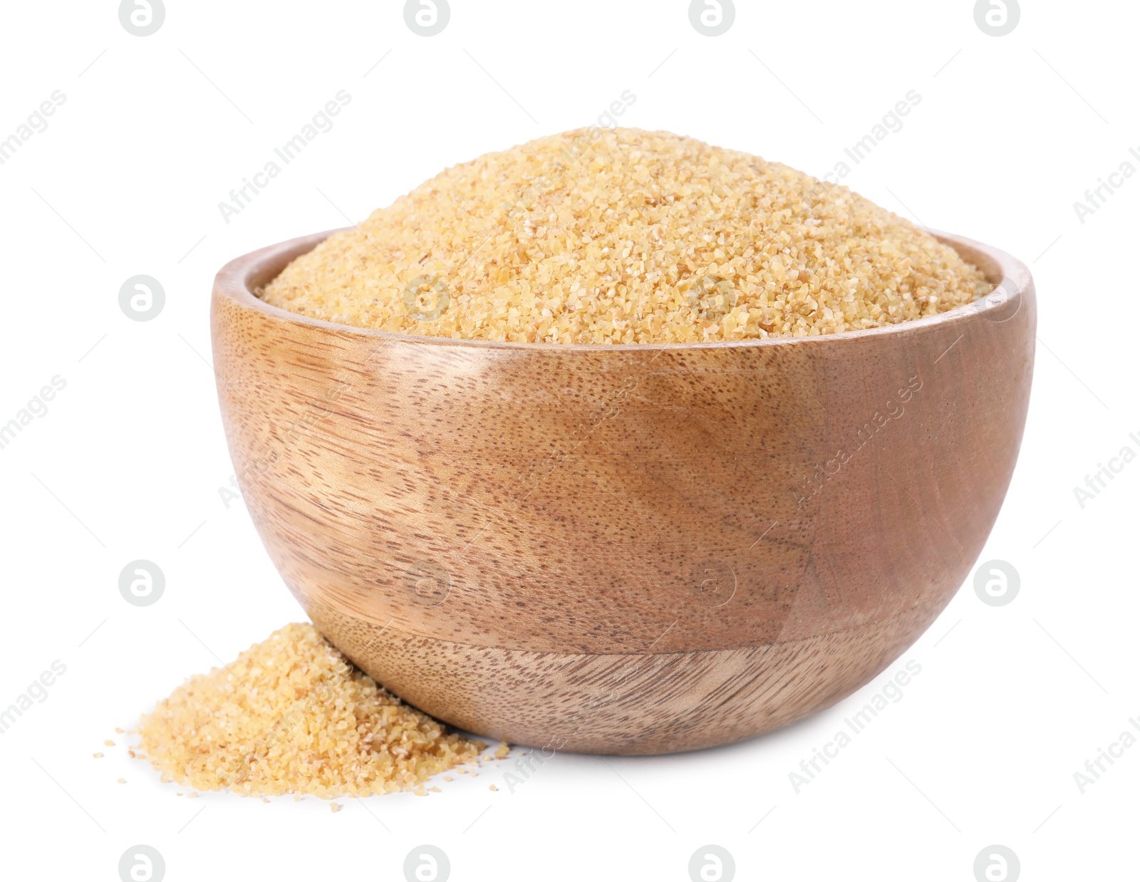 Photo of Raw wheat groats in bowl isolated on white