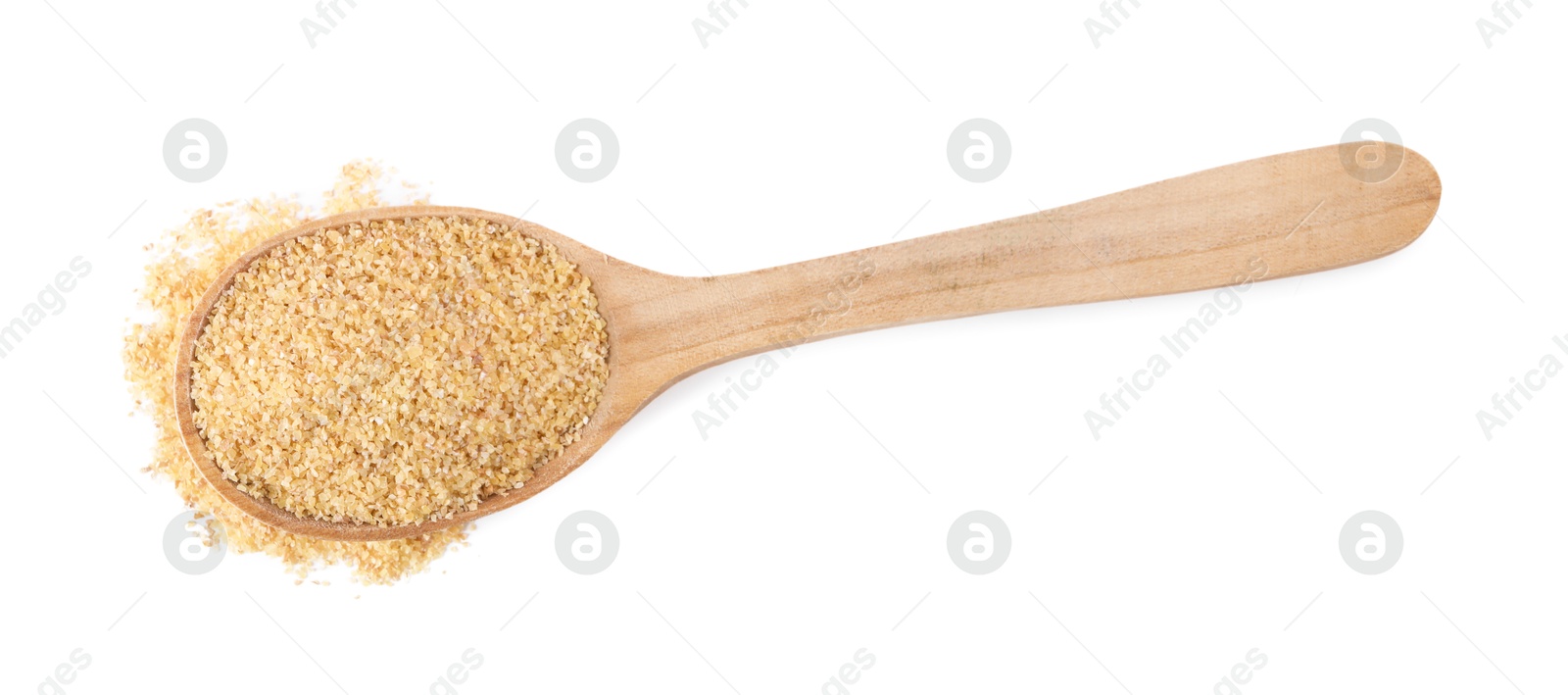 Photo of Spoon with raw wheat groats isolated on white, top view