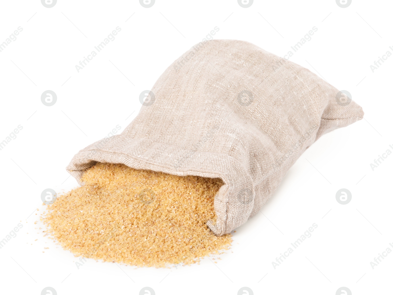 Photo of Raw wheat groats in sack isolated on white