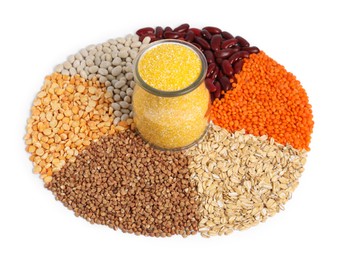 Photo of Dry cornmeal in jar surrounded by different cereals and legumes isolated on white