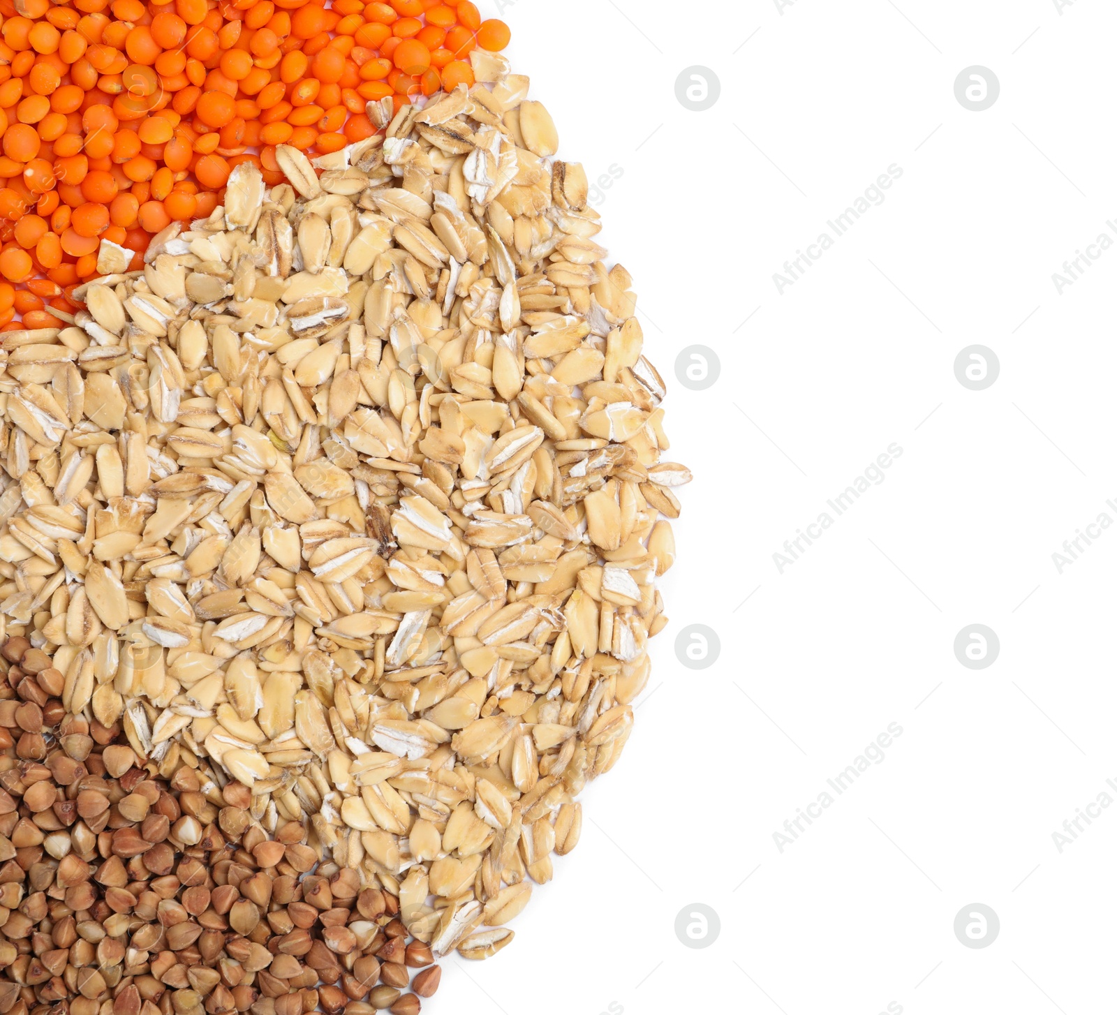 Photo of Dry oat flakes, buckwheat and lentils isolated on white, top view