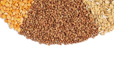 Photo of Dry buckwheat, peas and lentils isolated on white, top view