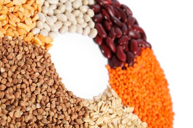 Photo of Different types of cereals and legumes on white background