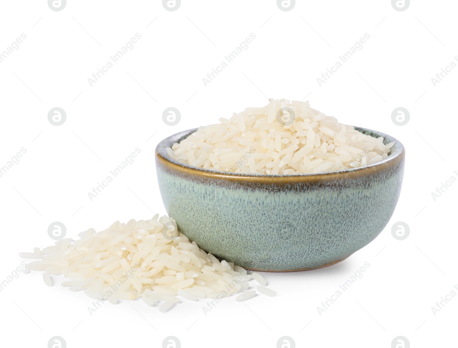 Photo of Raw rice in bowl isolated on white