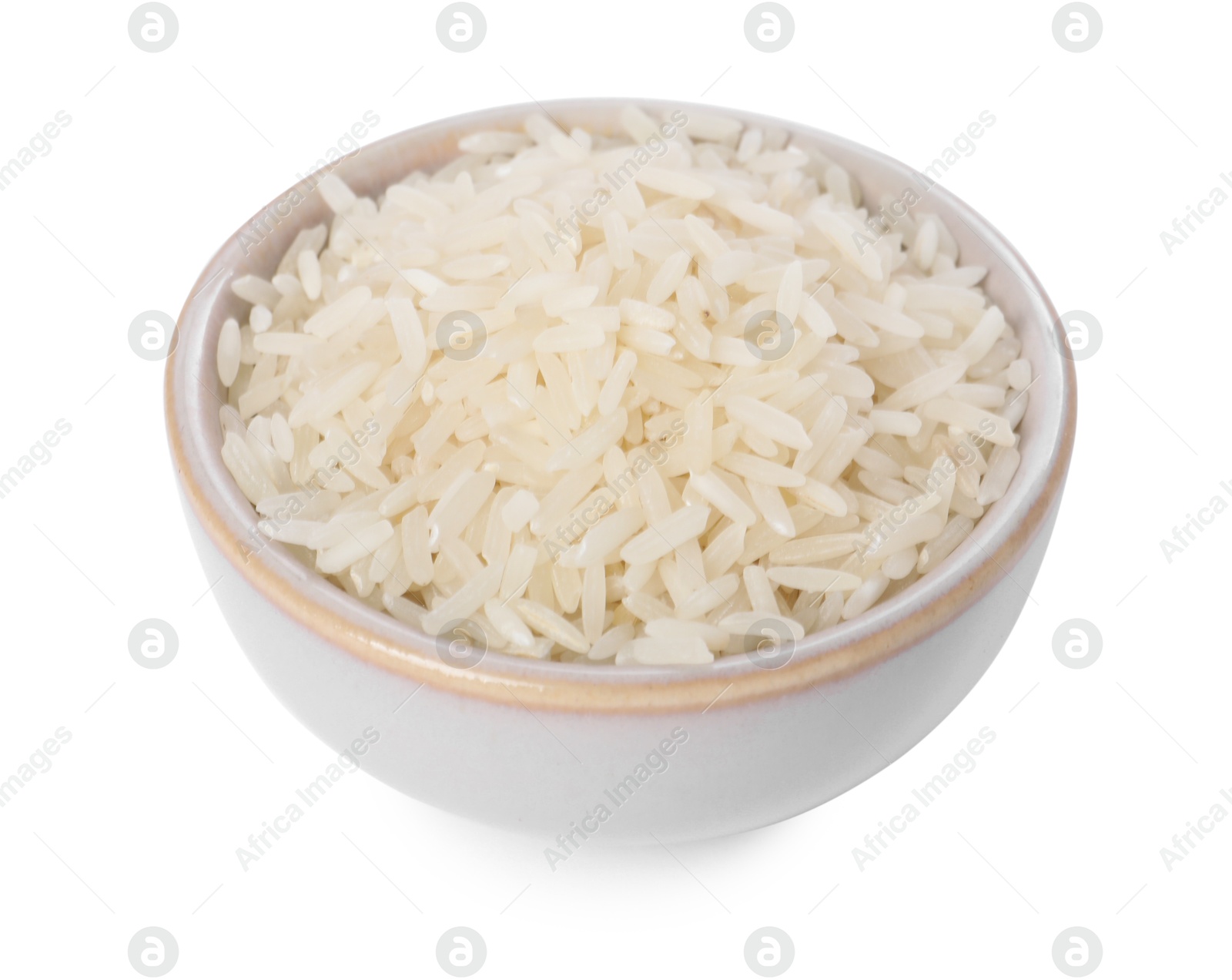 Photo of Raw rice in bowl isolated on white