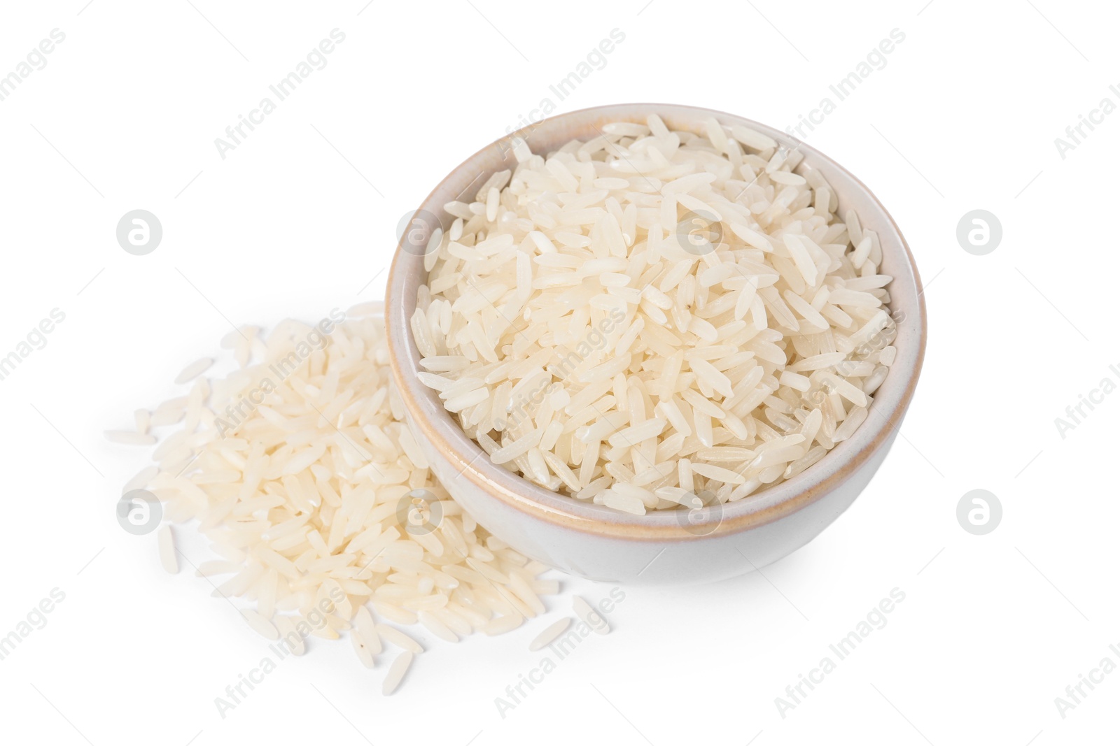 Photo of Raw rice in bowl isolated on white