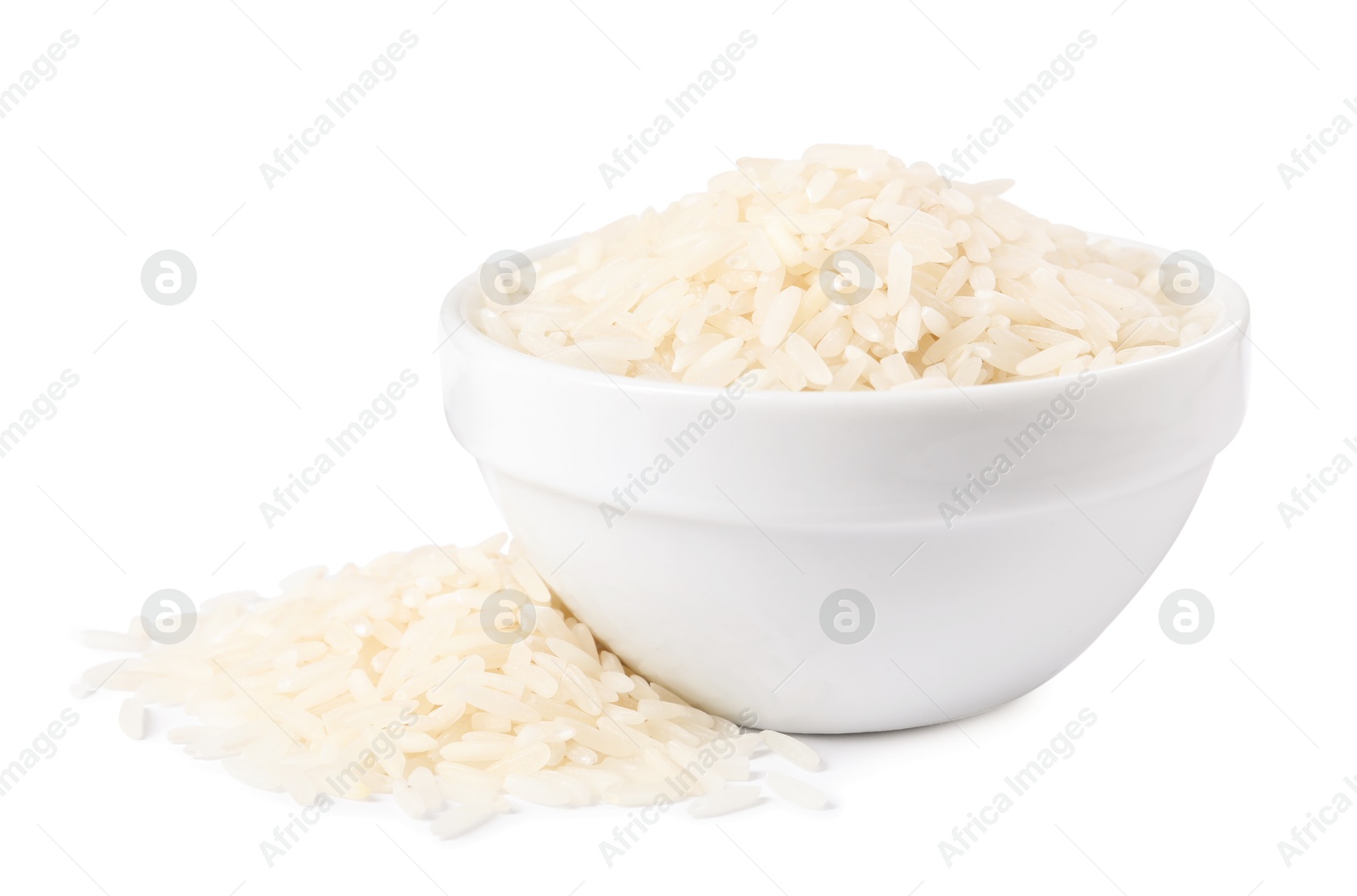 Photo of Raw rice in bowl isolated on white