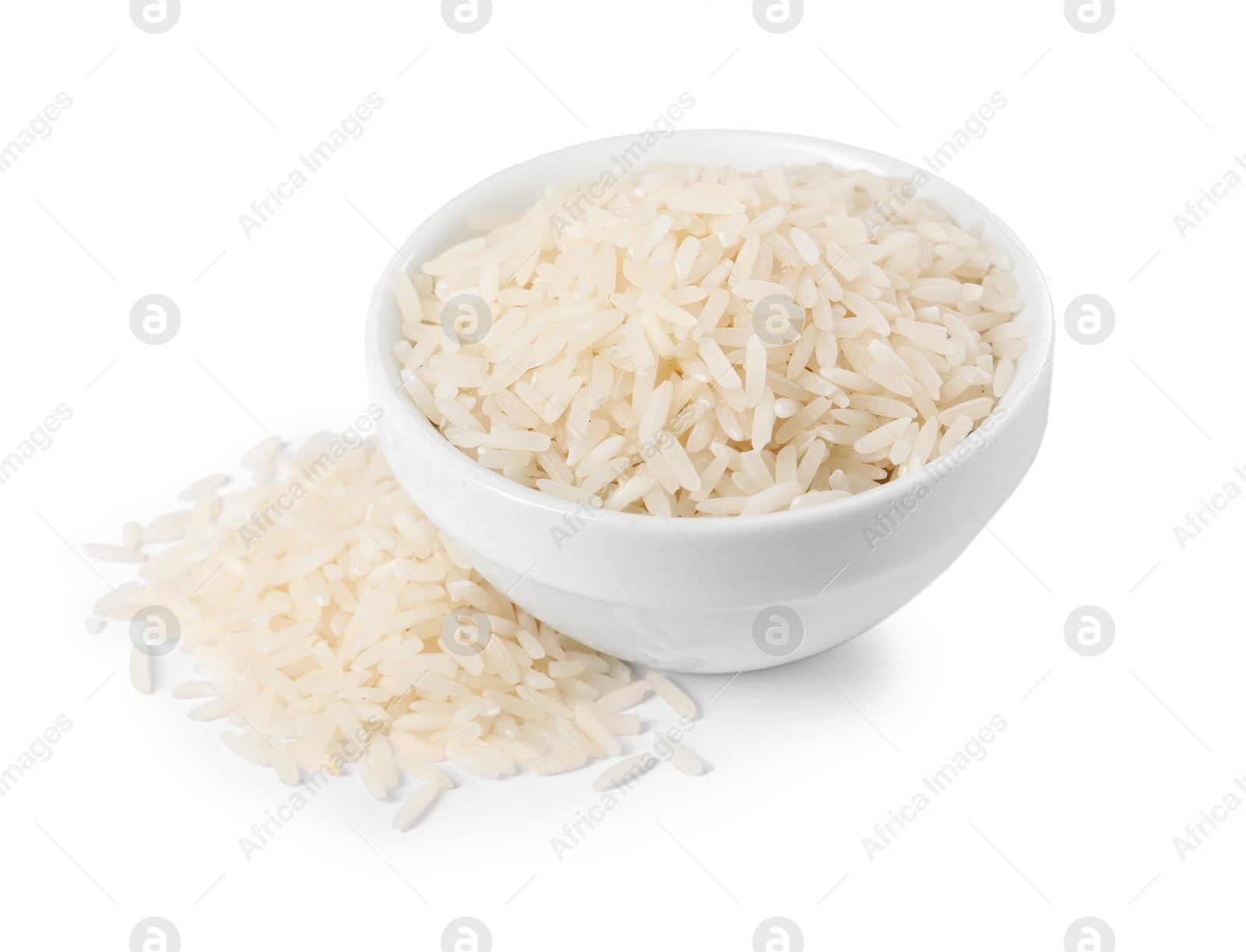 Photo of Raw rice in bowl isolated on white