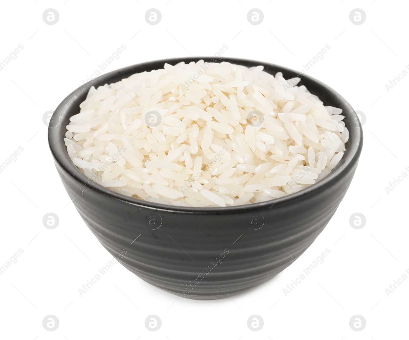 Photo of Raw rice in bowl isolated on white