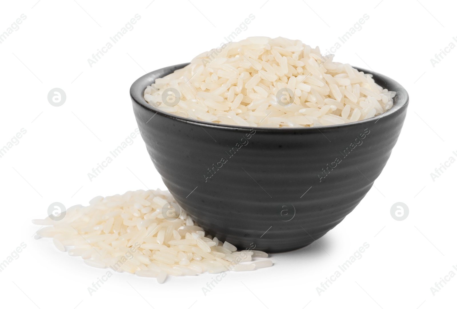 Photo of Raw rice in bowl isolated on white