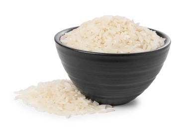 Photo of Raw rice in bowl isolated on white