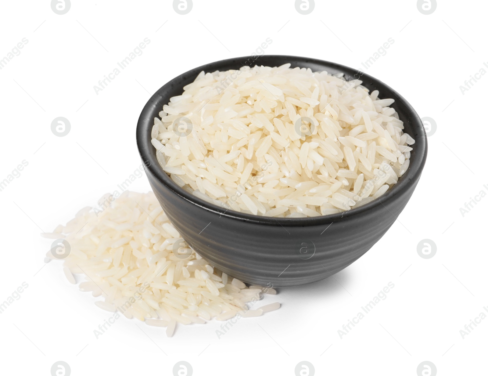 Photo of Raw rice in bowl isolated on white