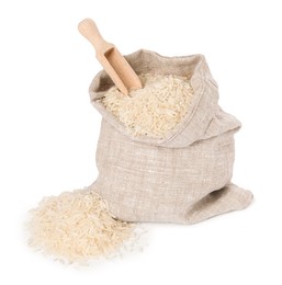 Photo of Raw rice and scoop in sack isolated on white