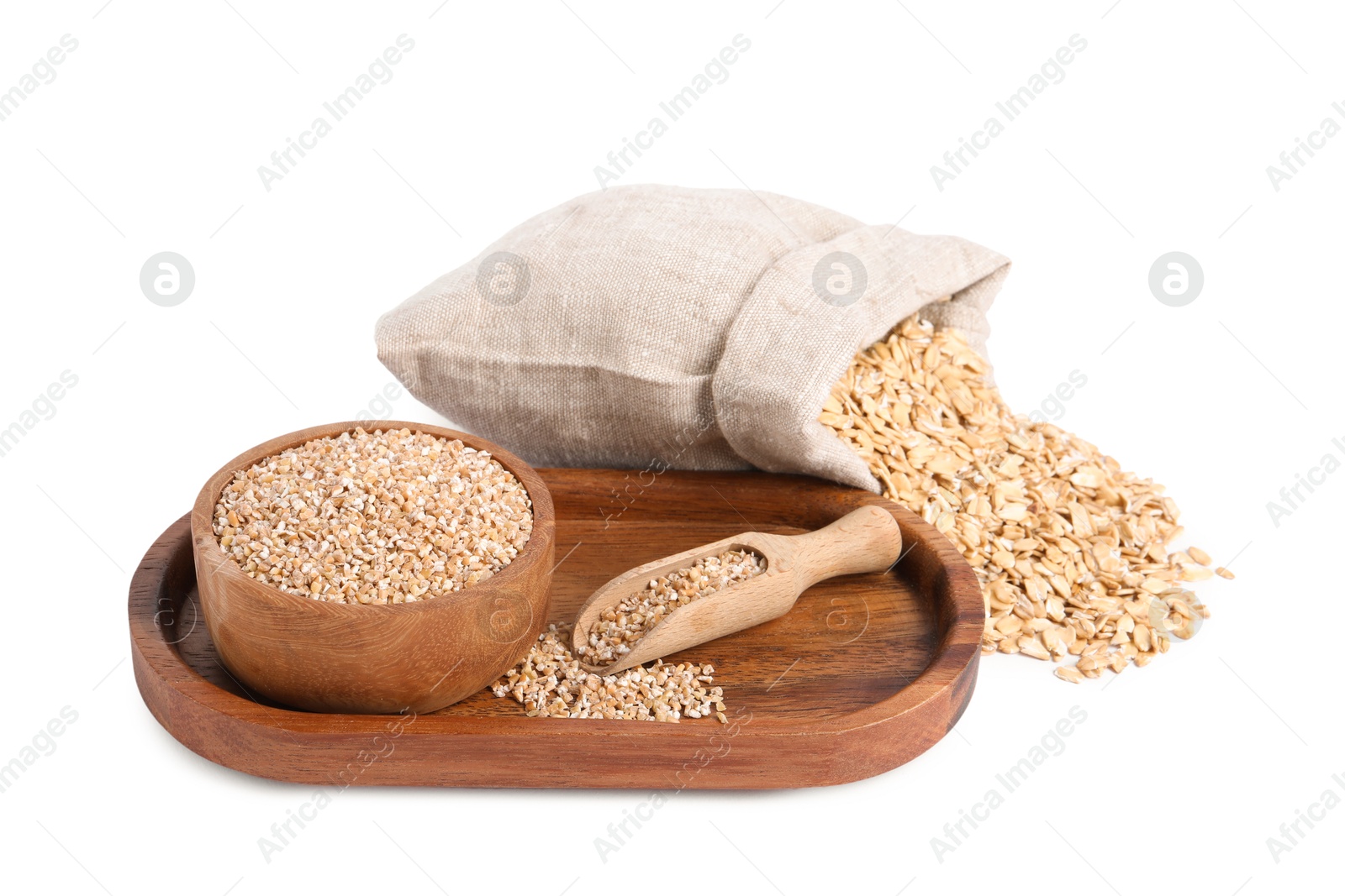 Photo of Dry wheat groats in bowl, scoop and sack with oat flakes isolated on white